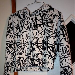 Black and white Long sleeve crop top. Size small. Brand is No Comment